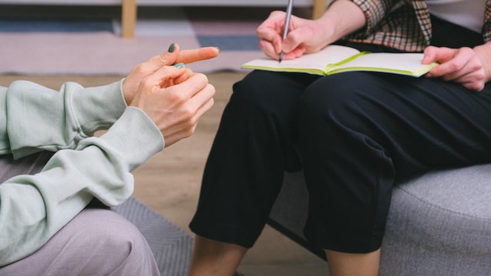 Occupational Therapist talking to patient