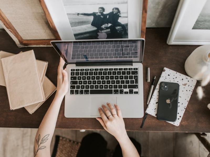 Woman working in front of Laptop